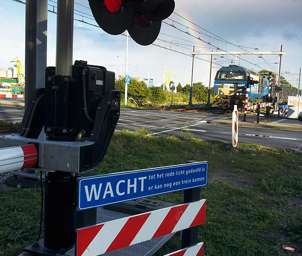 Waiting for a (very long) train and looking at another rainbow.