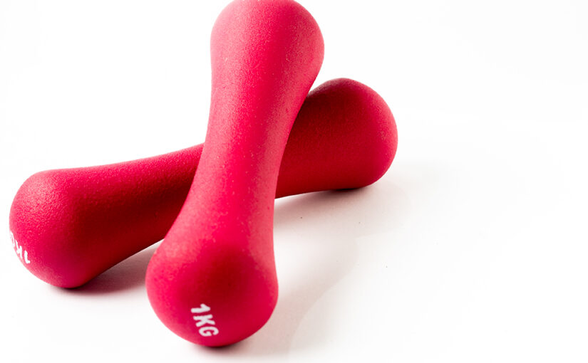 Pink weights, although they look like bones to me
